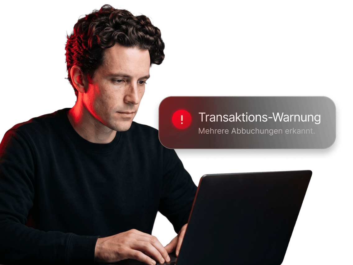 Jemand, der auf seinem Laptop eine Benachrichtigung der Transaktions-Überwachung von NordVPN überprüft.