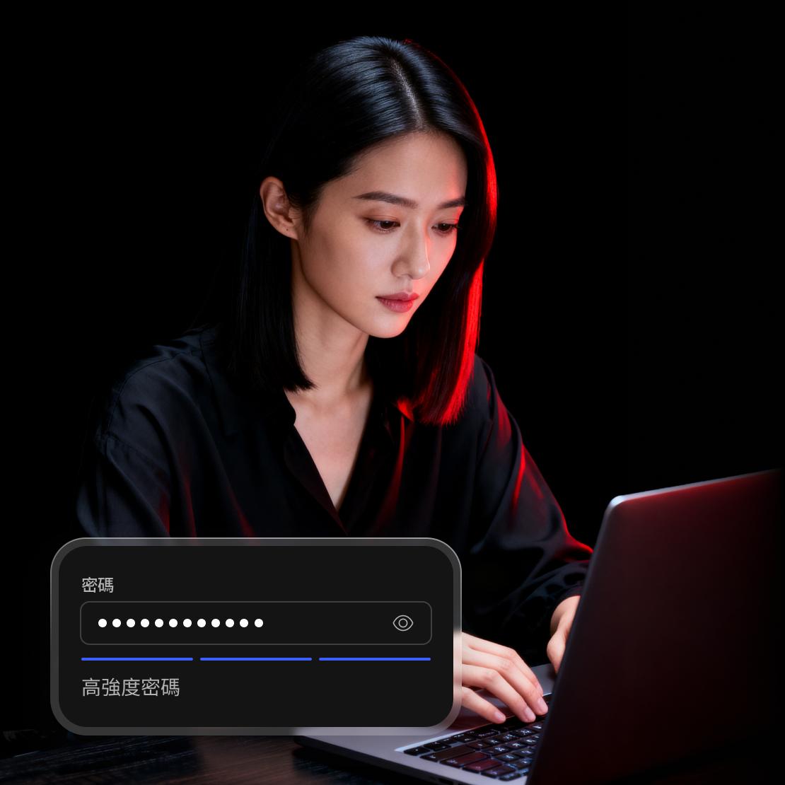 一名使用者在筆記型電腦上變更密碼。