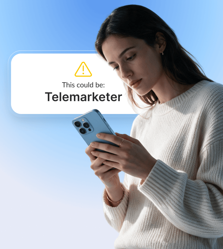 A woman uses a free telemarketing blocker.