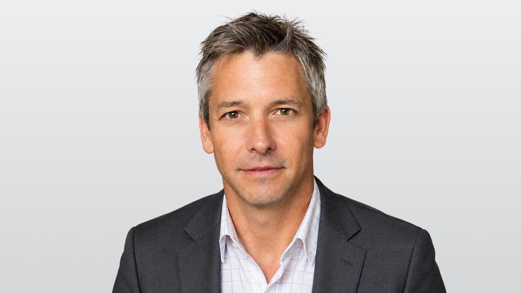 A portrait of Tomas Sinicki, the Managing Director at Coveron.