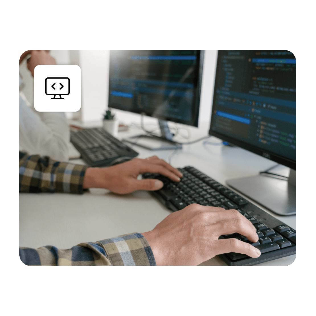 A man in hacking conference types on his computer keyboard