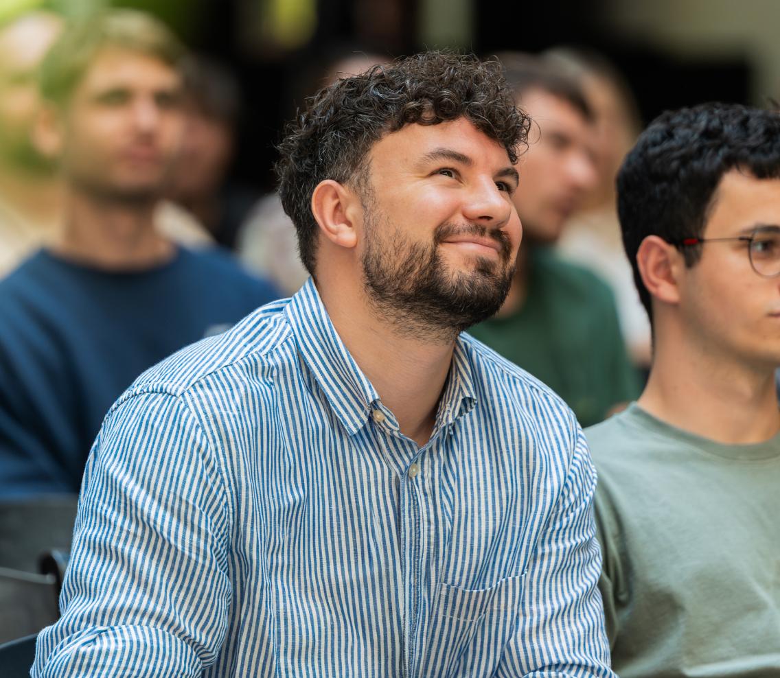 Nord Security employee smiling during a company event.