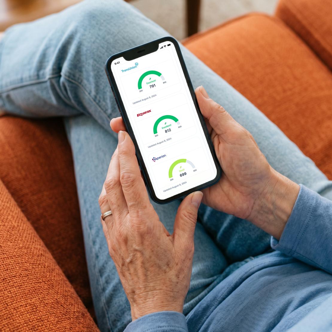 A person checking their credit score on their smartphone.