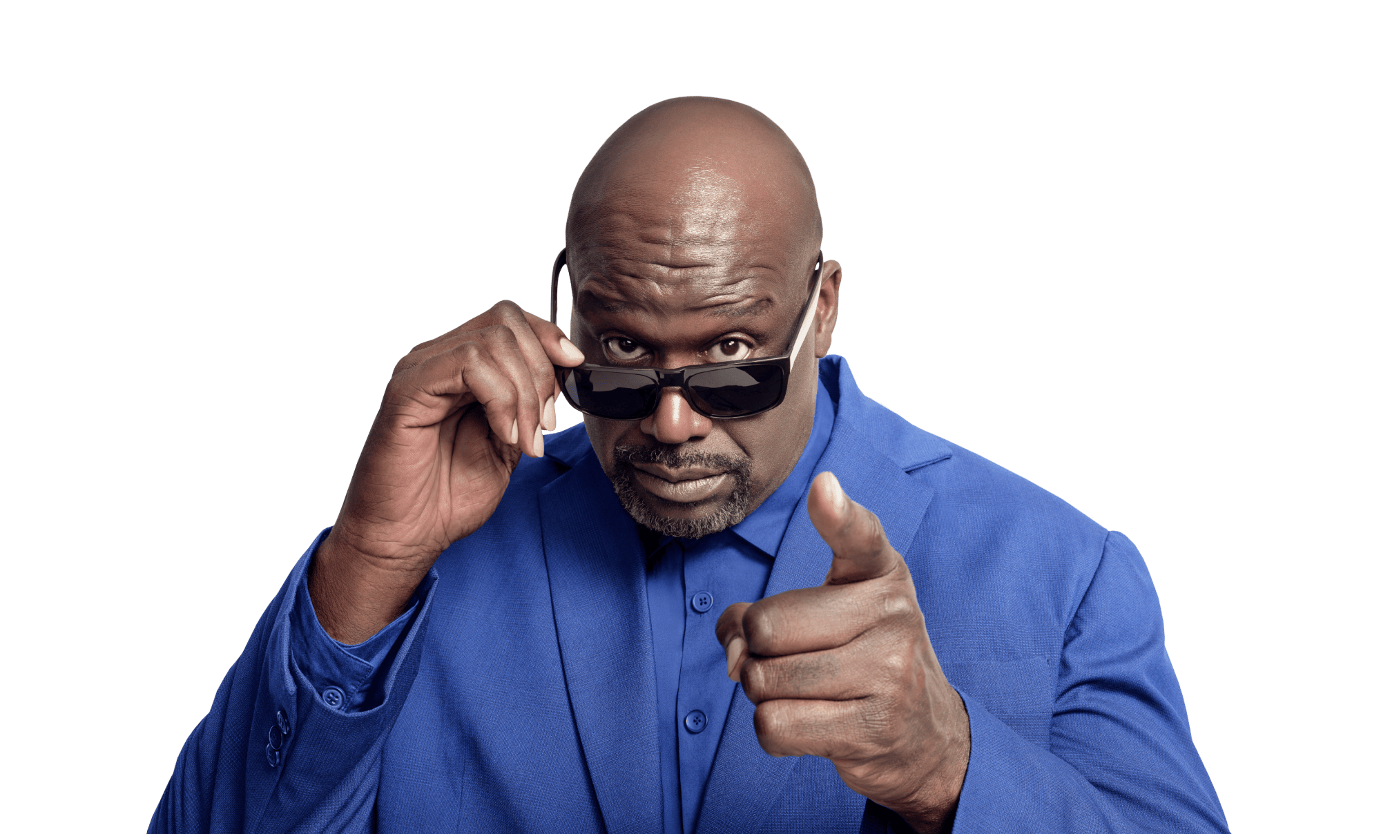 Shaquille O'Neal looking over his sunglasses and pointing at the camera.