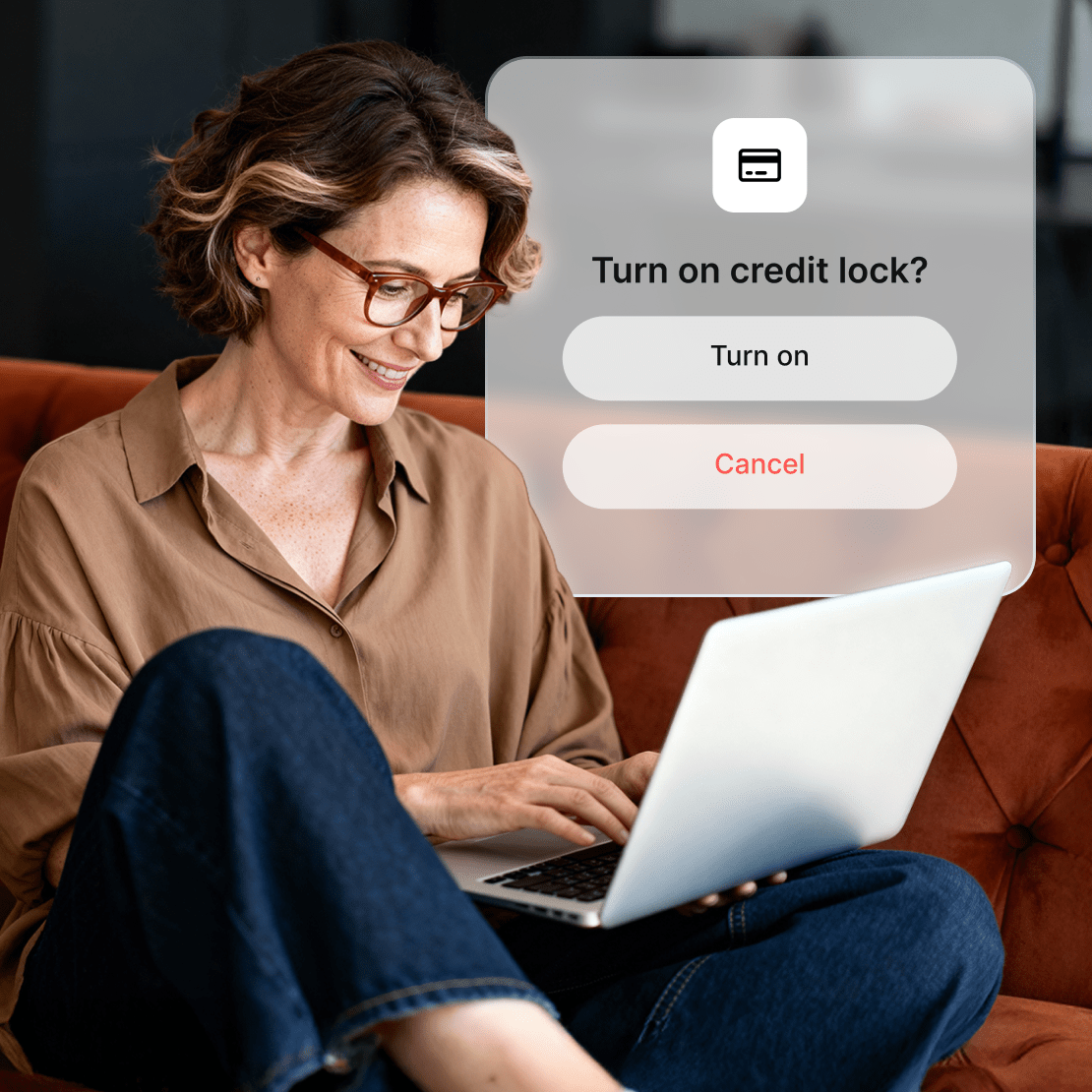 A person using their laptop to enable Coveron’s Credit Lock feature