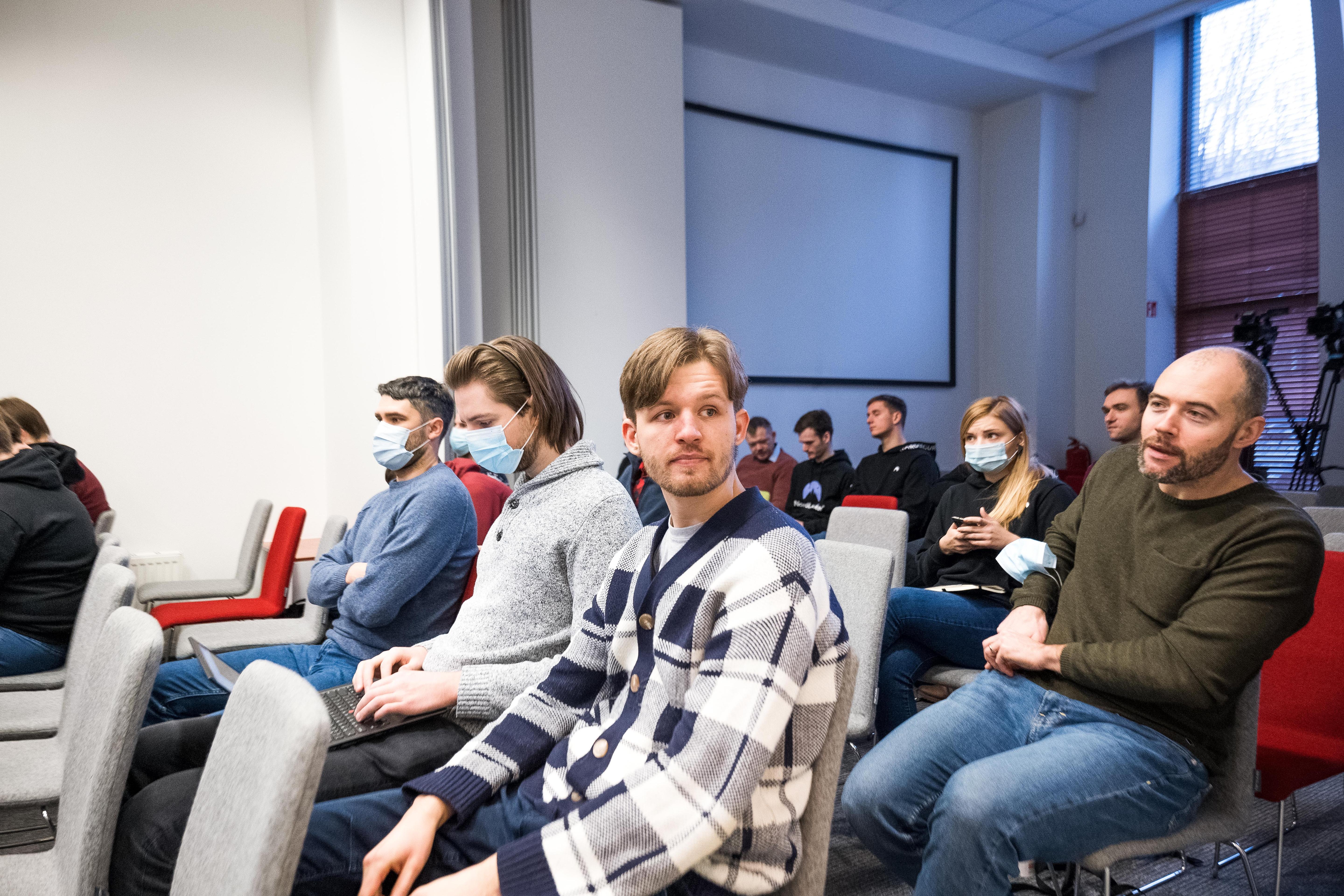 Colleagues seated in the audience at Nord Security Tech Days.