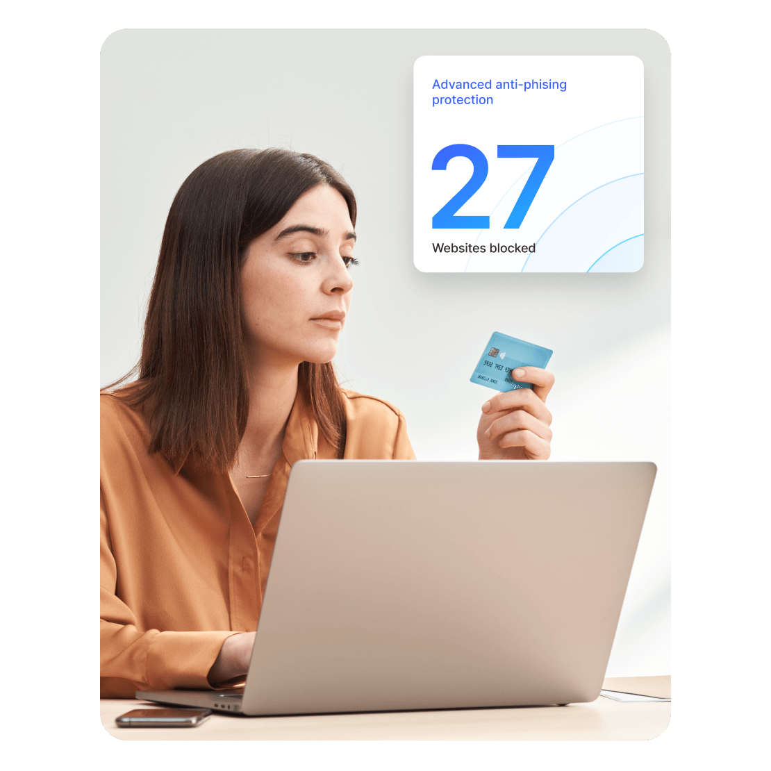 A woman uses advanced anti-phishing protection to shop safely online.