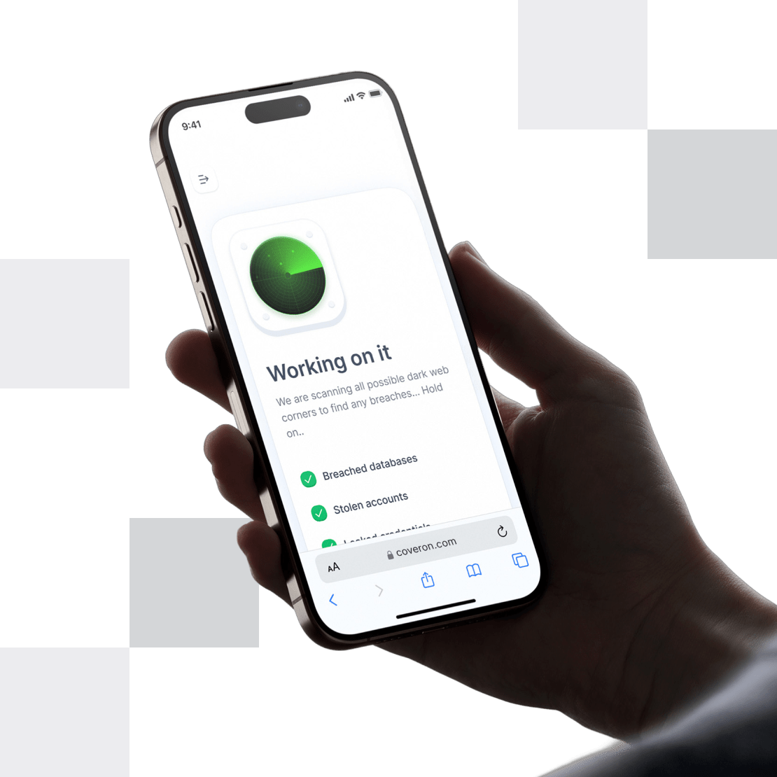 A person holding a smartphone while Coveron’s Dark web monitoring feature scans the dark web for leaks.