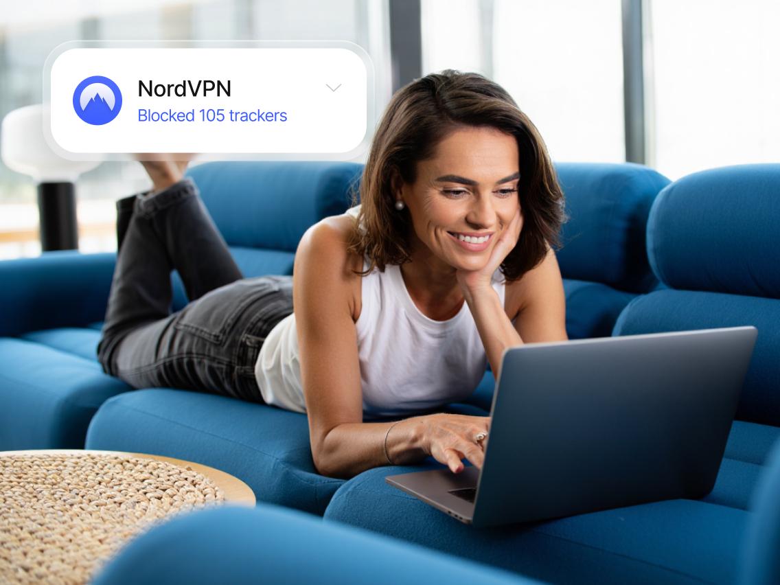 A person using the NordVPN tracker blocker on their device to shop safely online.