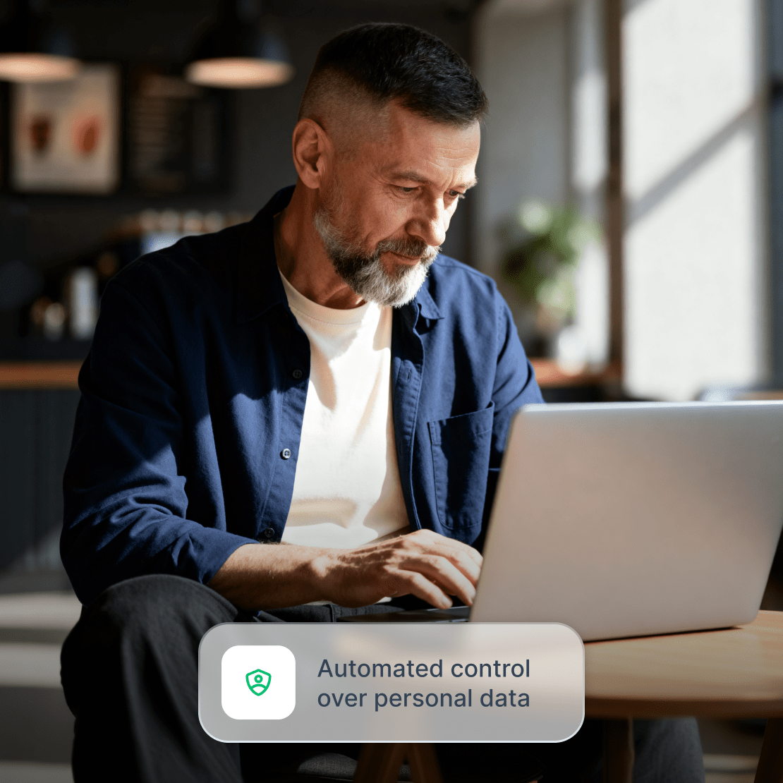 A person using the Incogni personal data removal tool on their laptop.