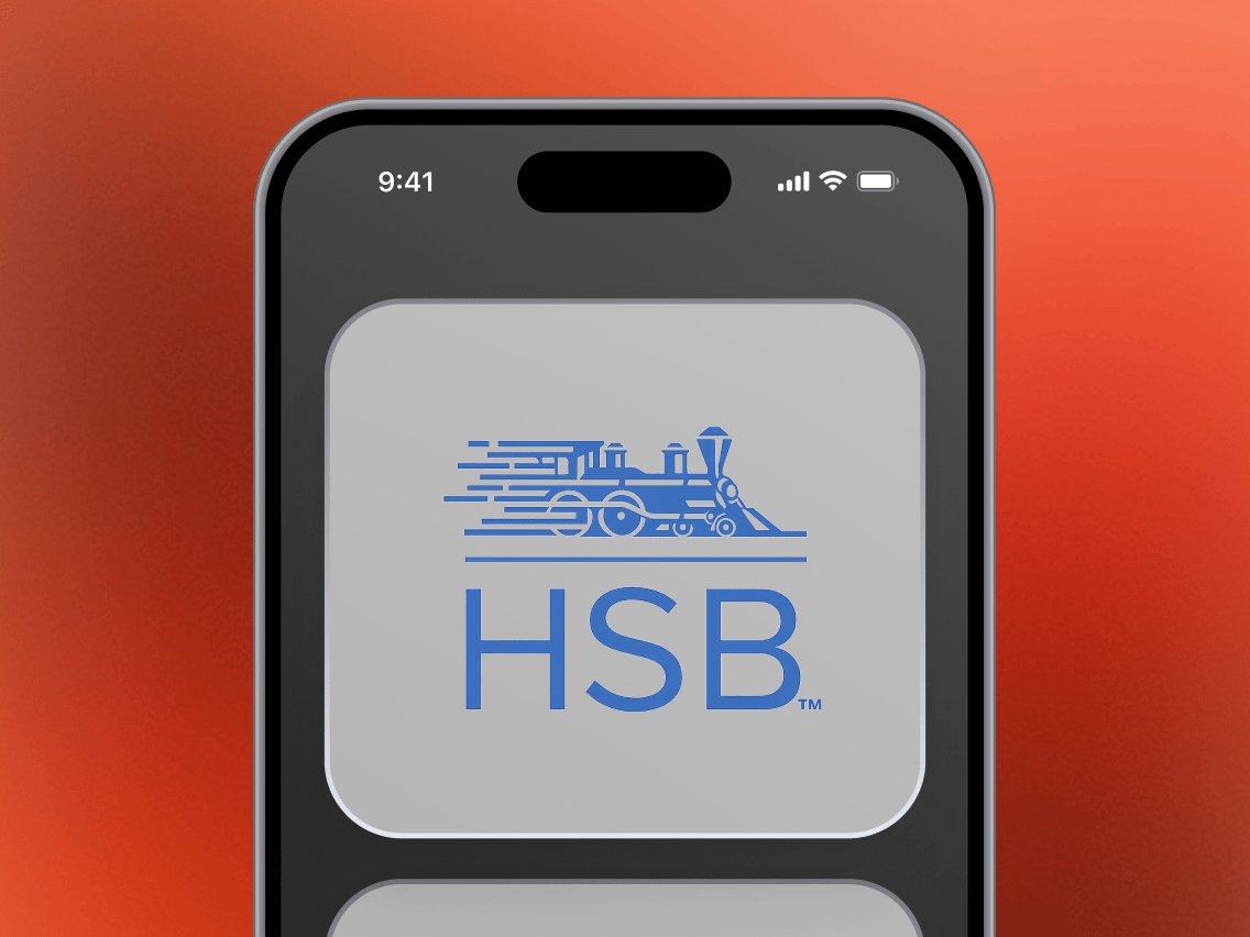 A phone displays the HSB logo, the provider of Coveron’s home title insurance benefit.