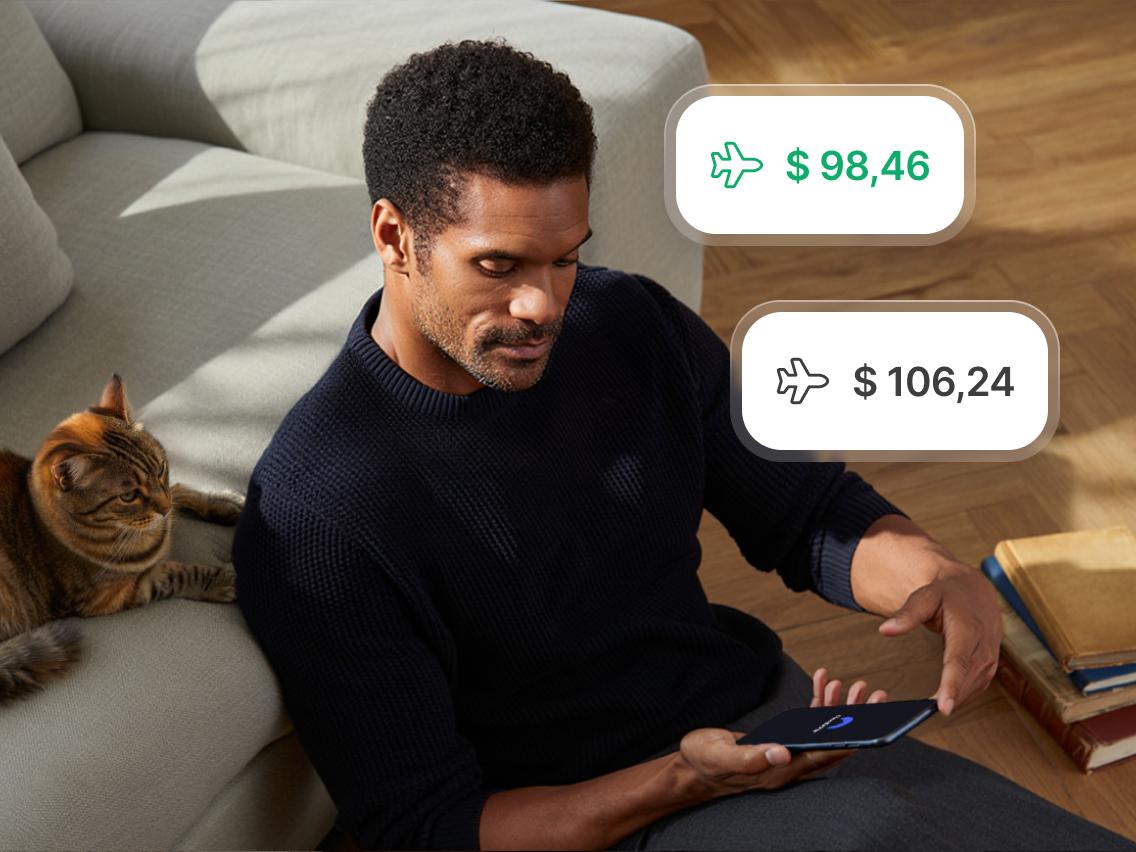 Uma pessoa procurando passagens aéreas mais baratas com o recurso de localização virtual da NordVPN.