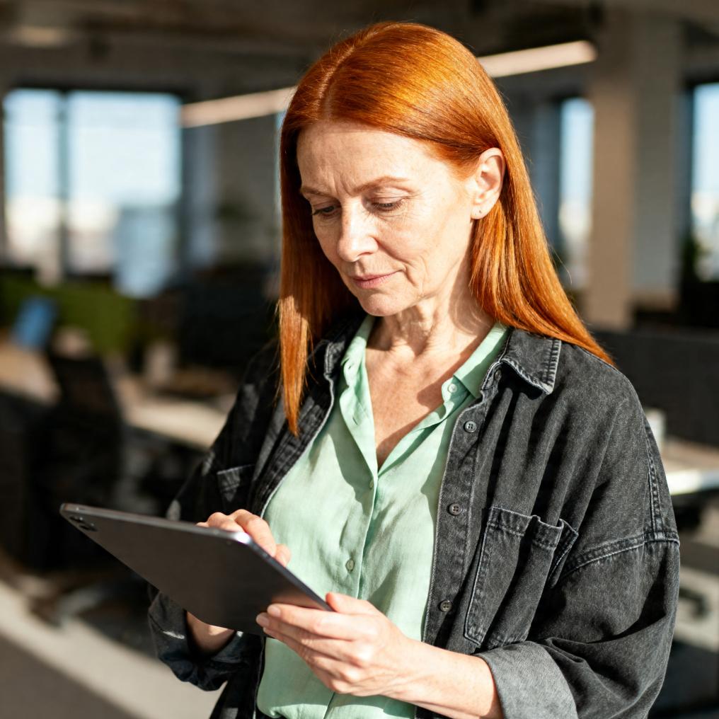 A person using Coveron on their tablet to explore identity theft recovery options.