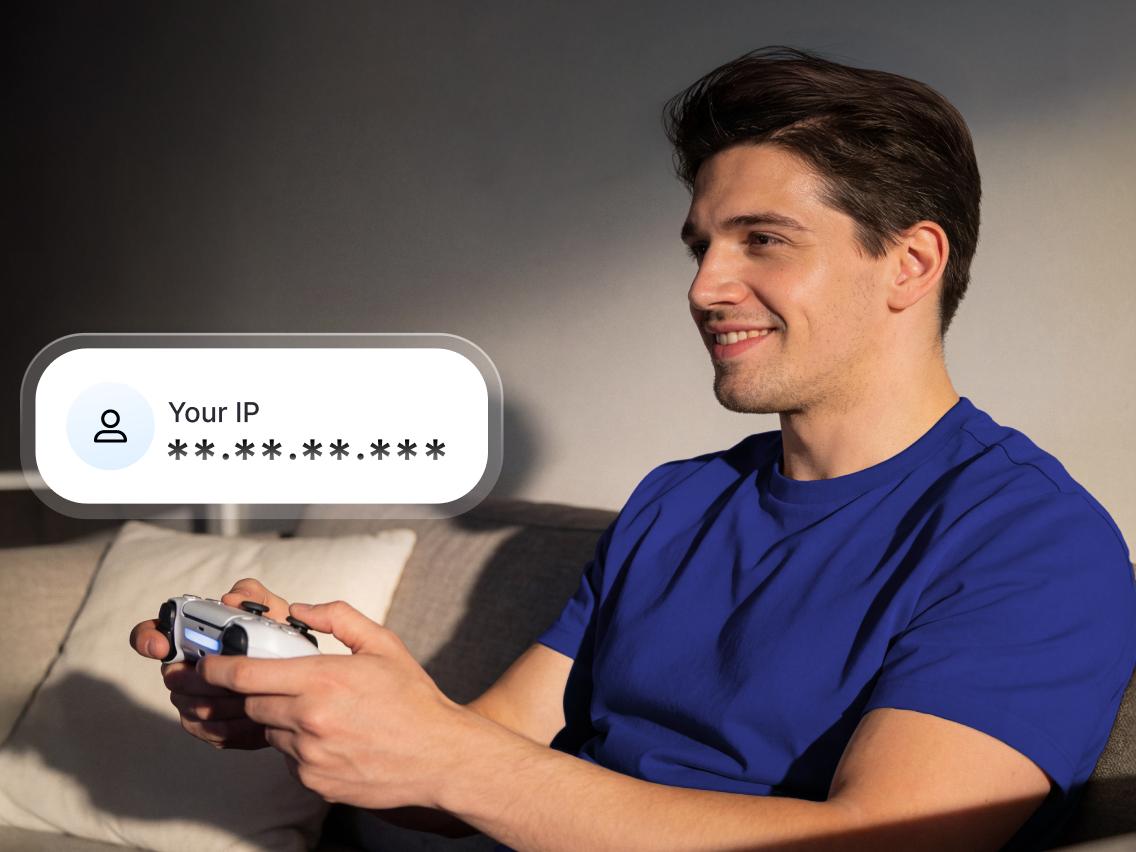 A man playing games while his IP address is protected from DDoS attacks by using a VPN for PS5.