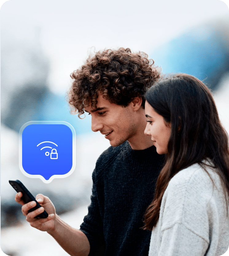 A man and a woman encrypting the internet connection on the man’s device.