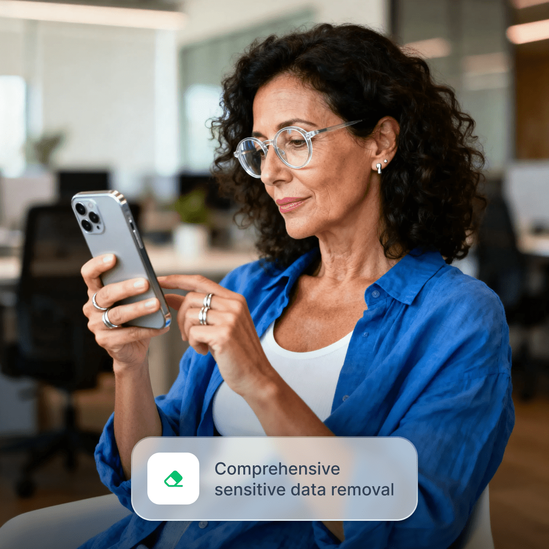 A person using Incogni on their smartphone for comprehensive data removal.