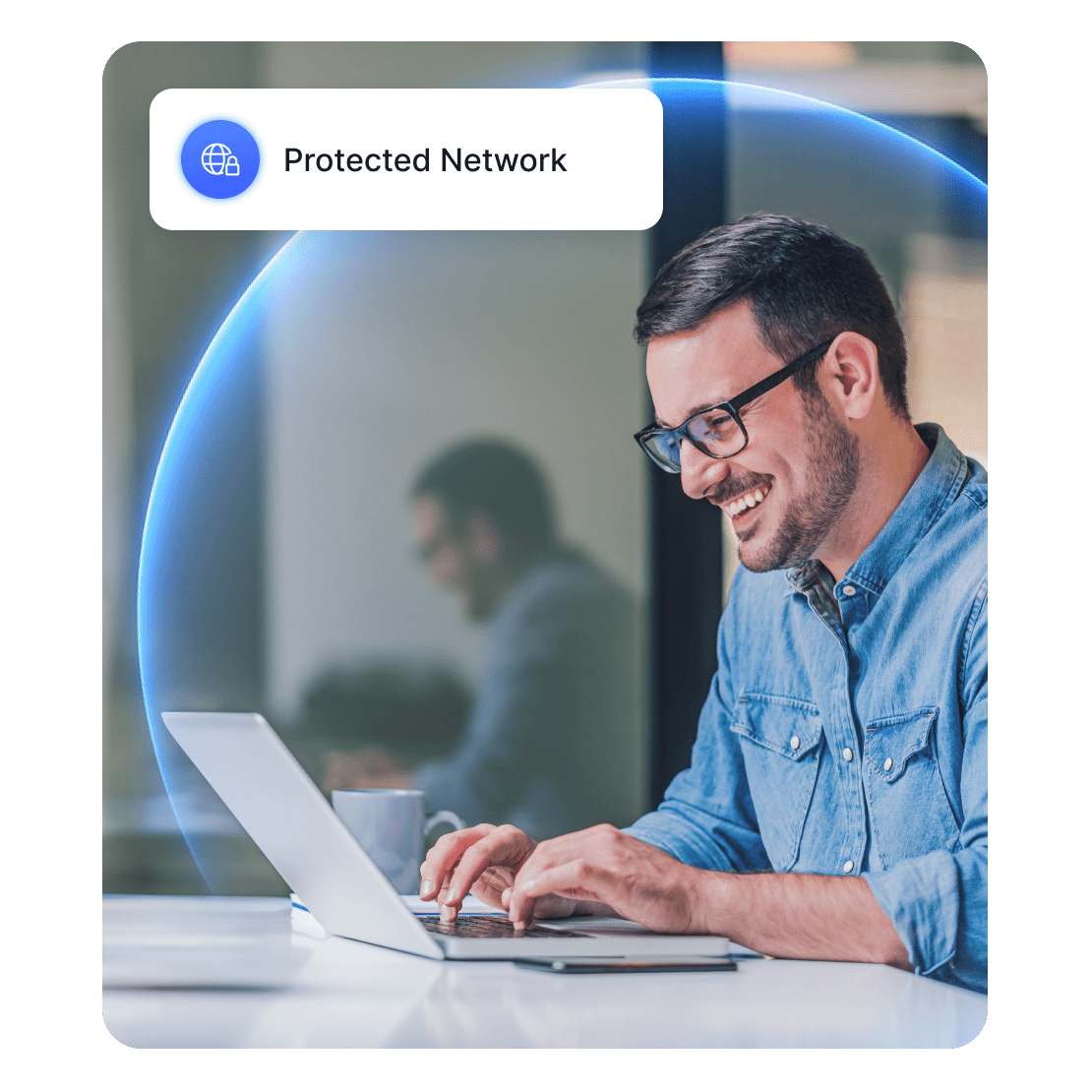 A smiling person browsing their laptop on a secure network.