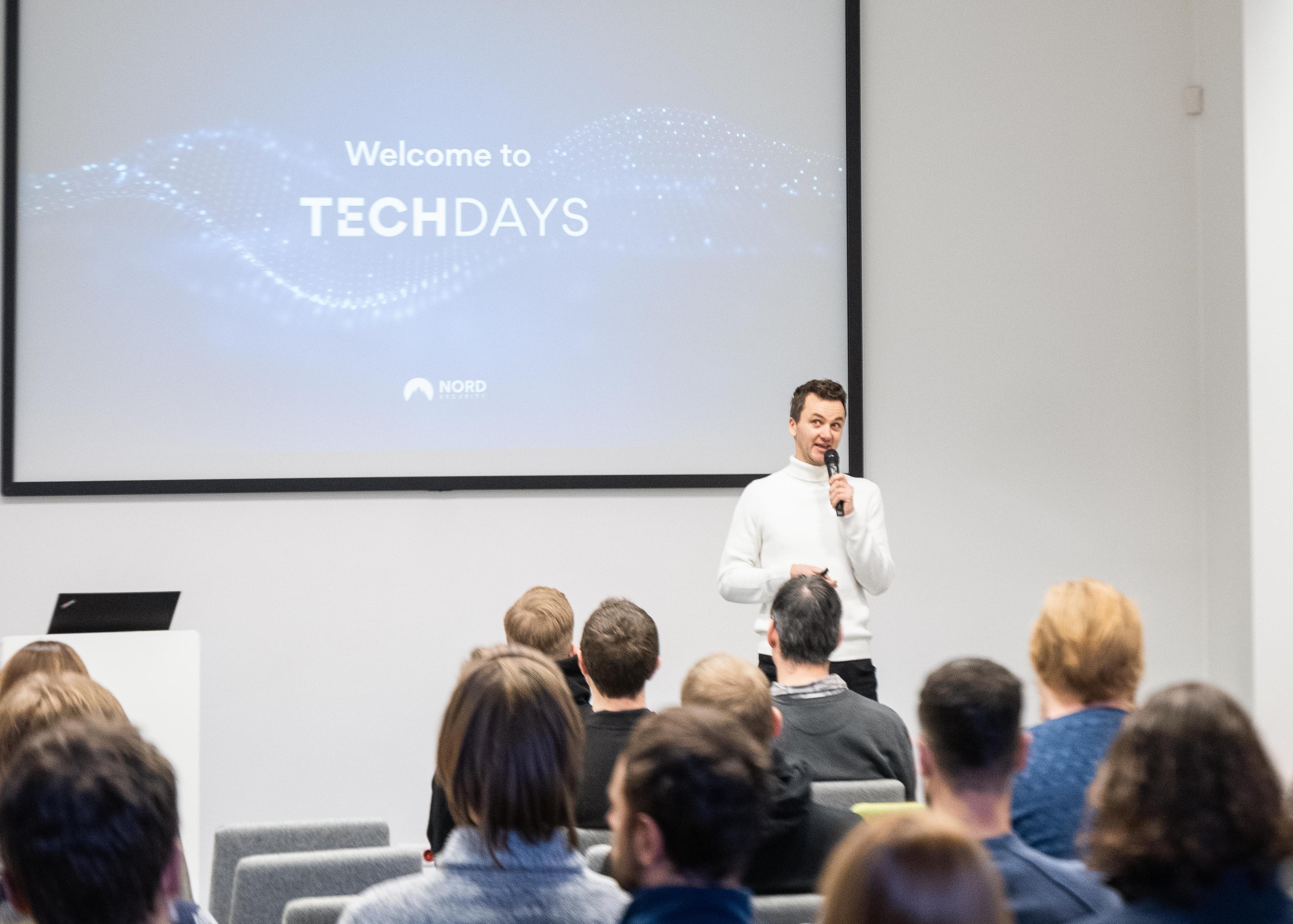 Marijus Briedis, CTO at NordVPN, opening Nord Security Tech Days in front of a Welcome to Tech Days slide.
