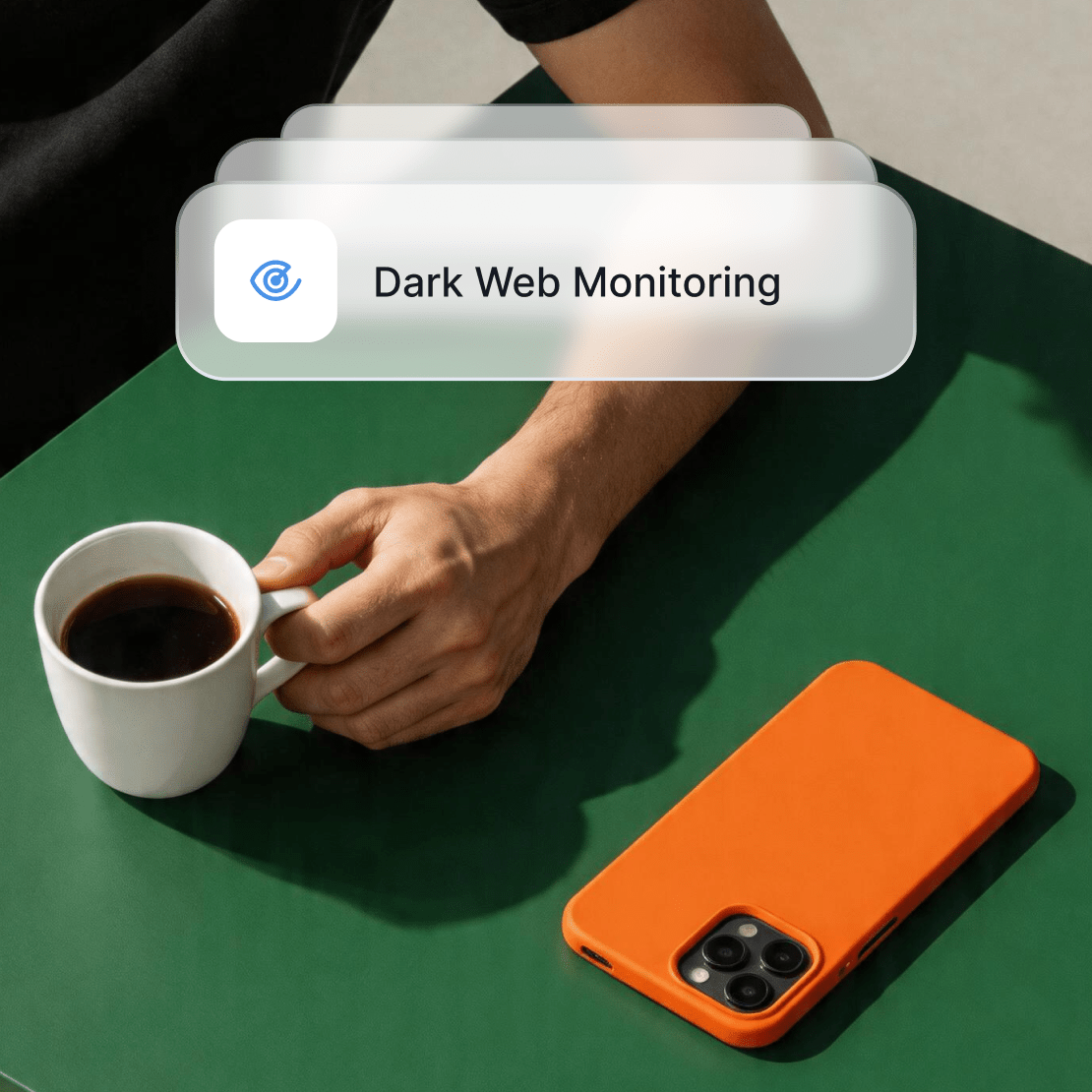 A person drinking coffee while protected by Coveron’s Dark Web Monitoring feature.