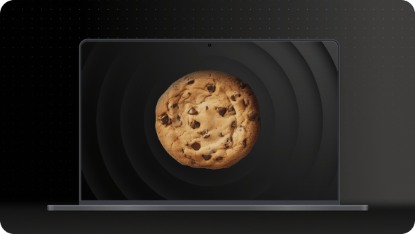 An image of a laptop screen with a chocolate chip cookie.