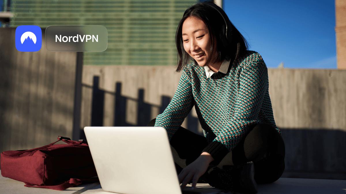 A laptop showing a globe with a blue checkmark shield, illustrating the NordVPN Linux app.