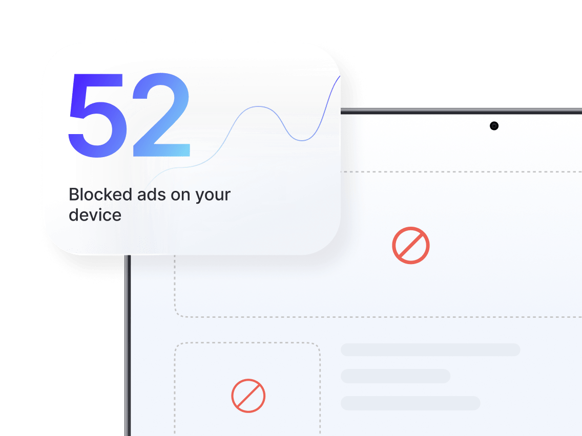 A laptop screen displaying an alert notification for blocked ads.