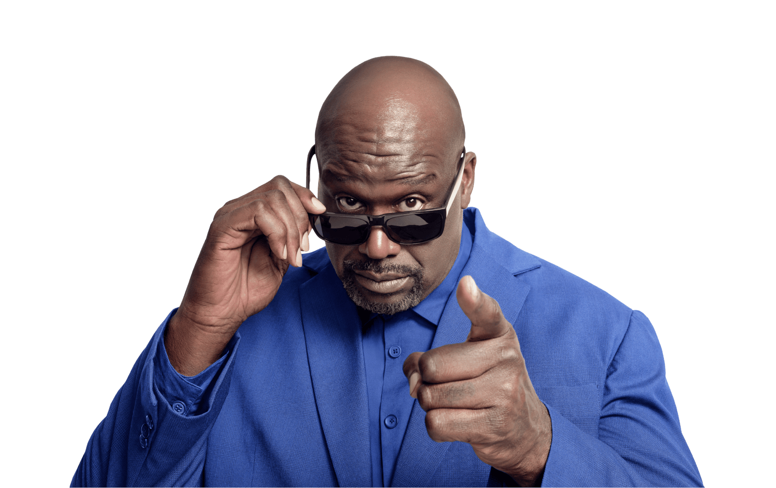 Shaquille O'Neal looking over his sunglasses and pointing at the camera.