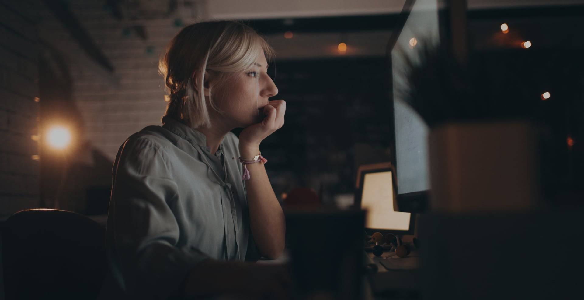 hero woman computer dark room