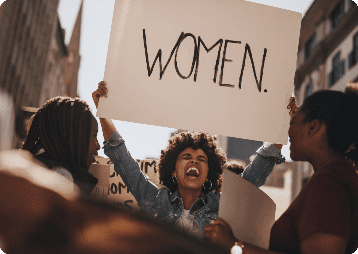 Woman protesting with a sign