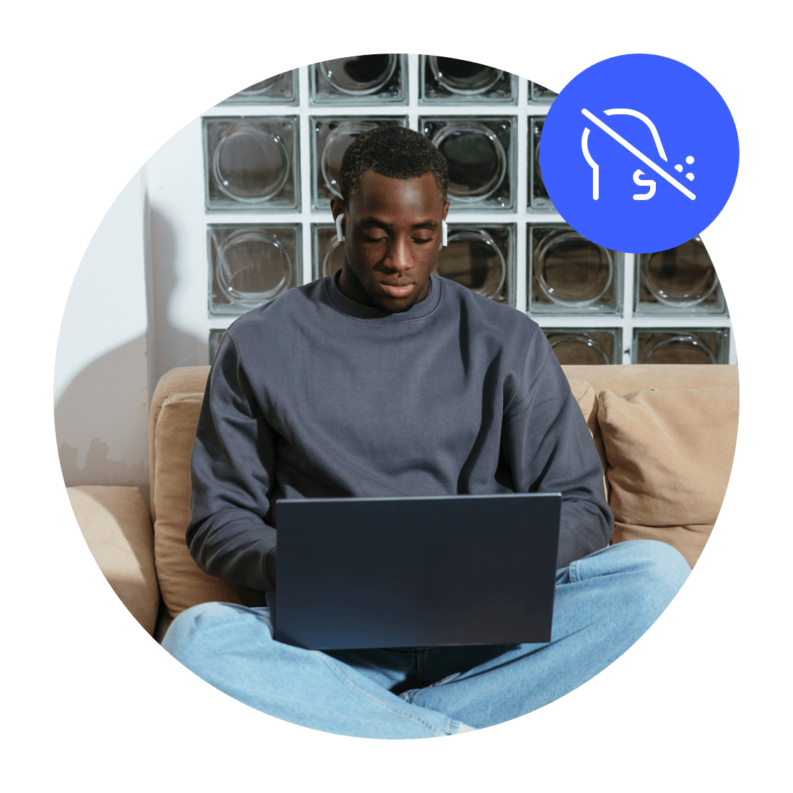 Man sitting on a couch, browsing the internet with NordVPN to avoid censorship.